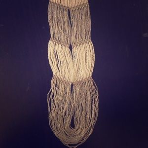 Long white beaded necklace